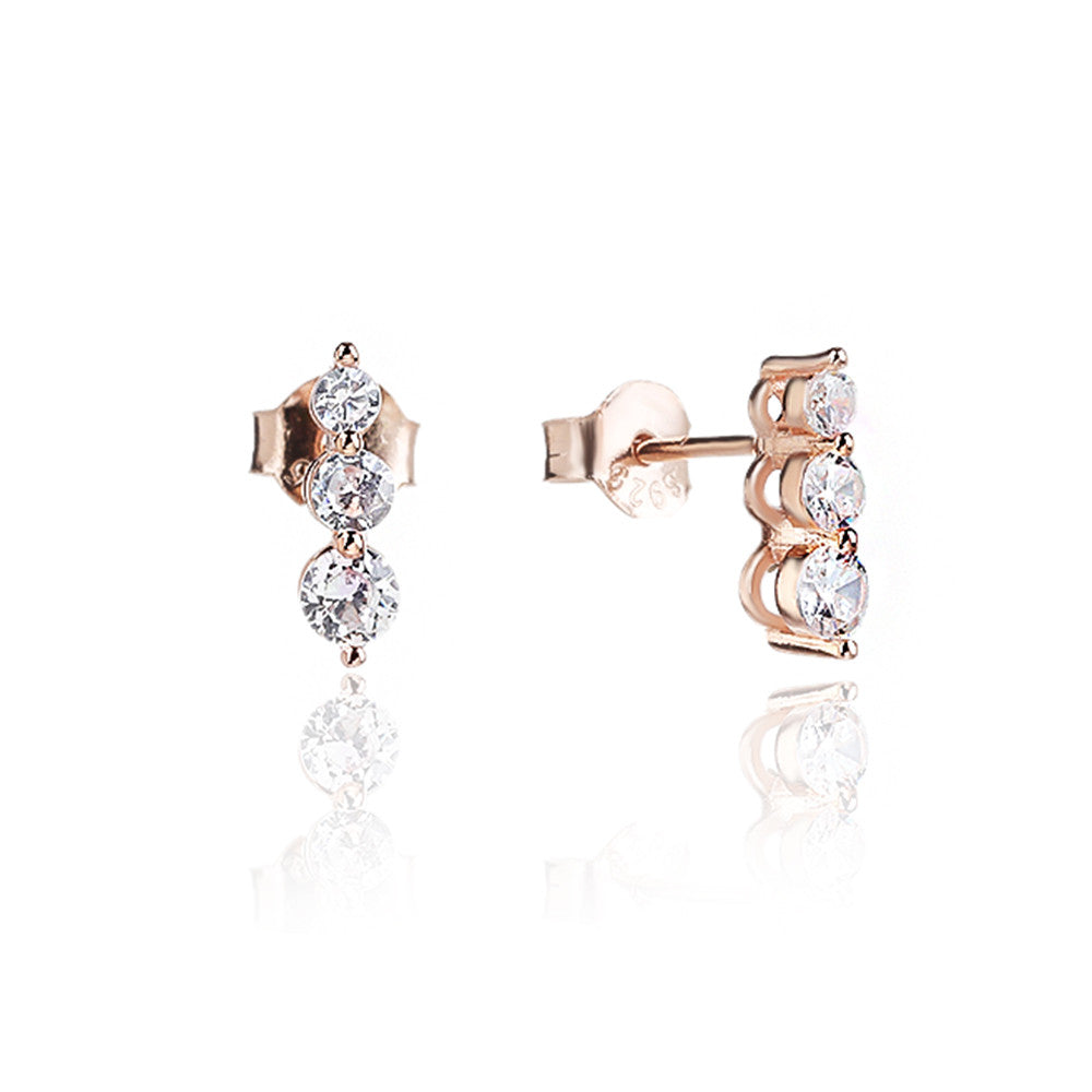 עגילים צמודים בציפוי רוז גולד משובצים בזרקונים - דגם טיפות טל