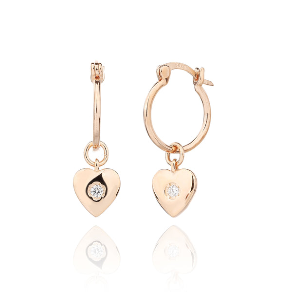 עגילים נופלים בציפוי רוז גולד משובצים בזרקונים - דגם זוהר